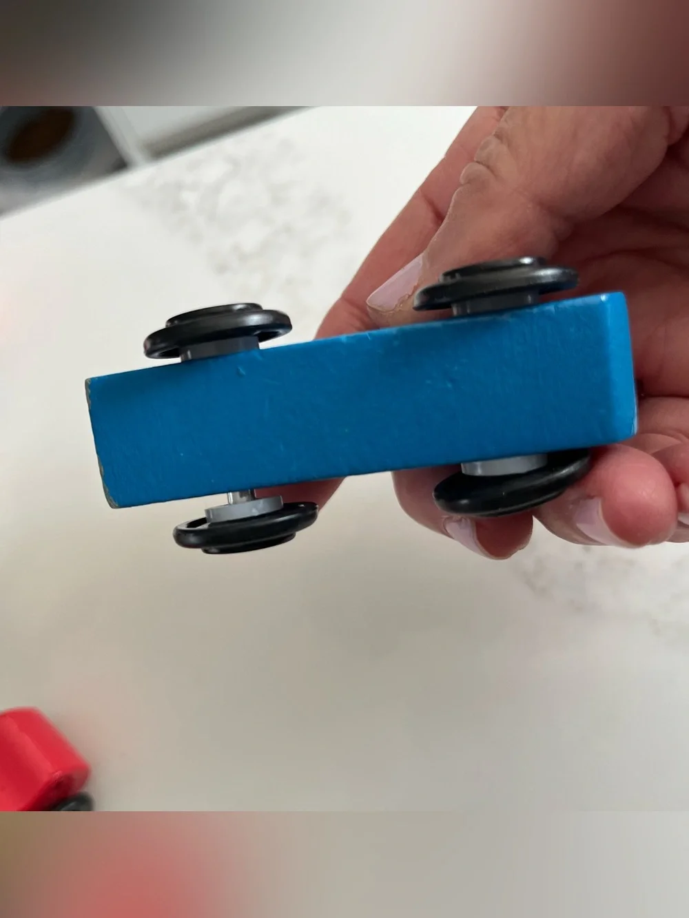 8 wooden cars and trucks.  Four are kidKraft.